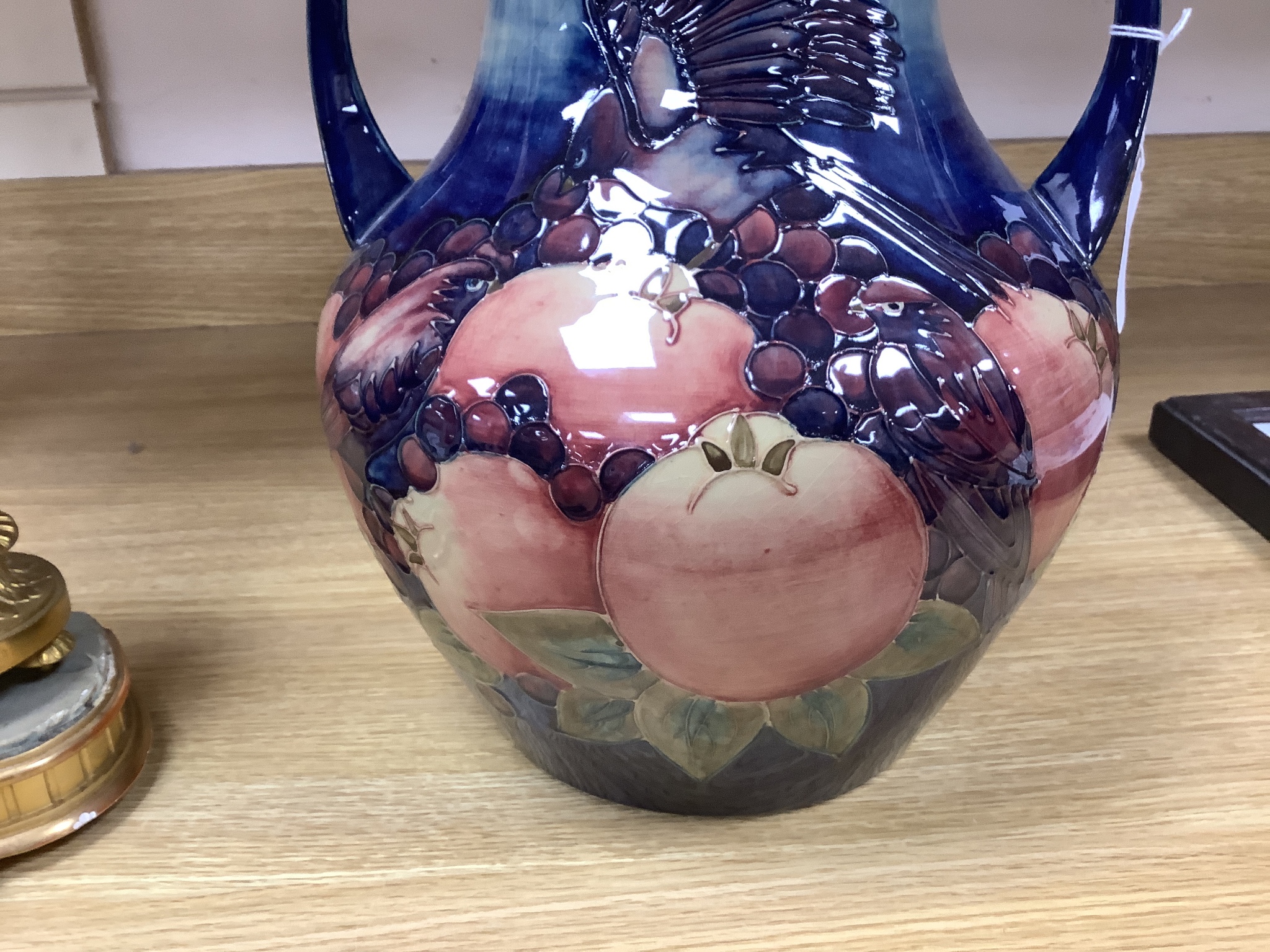 A large Moorcroft finches and fruit two handled vase, height 36cm